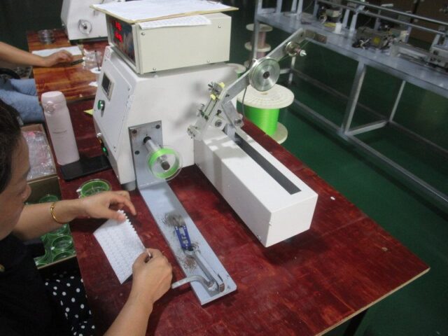 Operator using a meter-counting winder to spool fishing line
