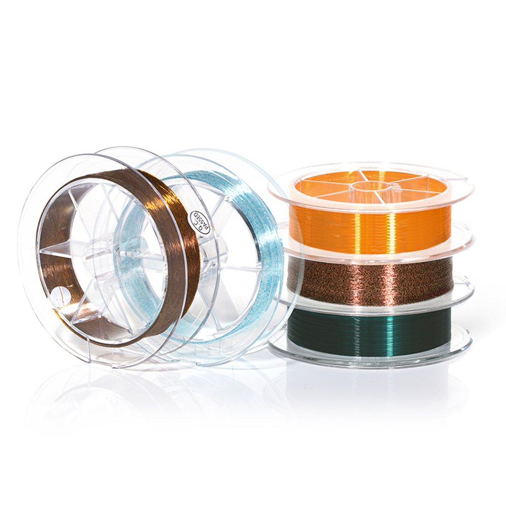 Nylon monofilament fishing line spools in clear blue, brown, orange and green